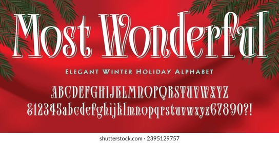 An elegant alphabet with a Christmas or winter holiday appearance. Background has red fabric and pine tree sprigs.