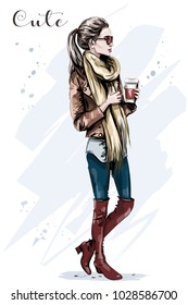 Elegant beautiful young woman with paper coffee cup. Hand drawn fashion woman. Sketch.