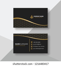 Elegant black business card with gold details