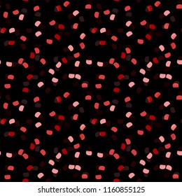 Elegant black seamless pattern with chaotic sparks in different shades of red and pink. Dark contrasting repeat backdrop using for cards, wallpapers, scrapbooking, print, gift wrap, manufacturing etc.