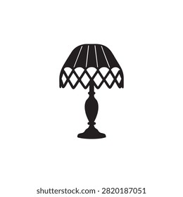 Elegant black table lamp with stained glass style shade isolated image