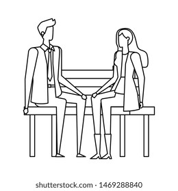elegant business couple seated in the park chair