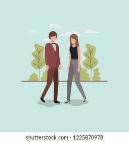 elegant business couple walking in the park