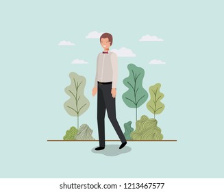 elegant businessman walking in the park