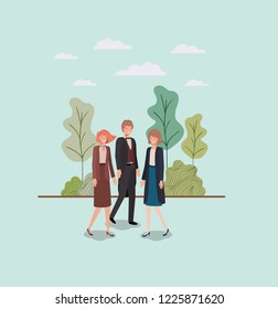 elegant businesspeople walking in the park