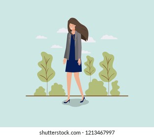 elegant businesswoman walking in the park