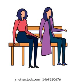 elegant businesswomen seated in the park chair