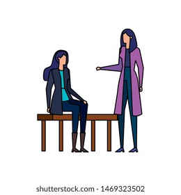 elegant businesswomen seated in the park chair