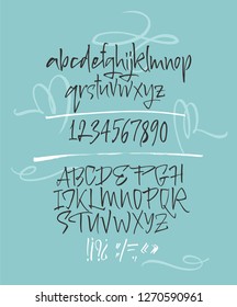Elegant calligraphic brush typeface with decor: baroque frame, swashes, pointer and blots.