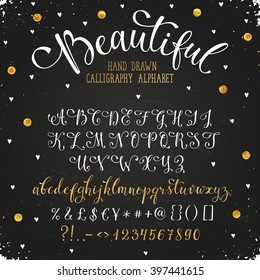 Elegant calligraphy letters with florishes. Handwritten alphabet with golden dots on blackboard. Uppercase, lowercase letters, numbers and symbols. Hand drawn modern and classy script. 