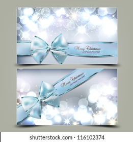 Elegant Christmas greeting cards with blue bows and place for text. Vector Illustration.