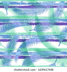 Elegant coconut palm leaves tree branches over painted stripes seamless pattern design. Brazilian jungle foliage summer fashion print. Tropical leaves and stripes seamless.