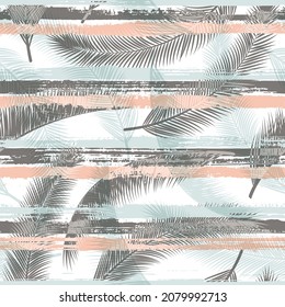 Elegant coconut palm leaves tree branches over painted stripes seamless pattern design. Polynesian jungle foliage summer fashion print. Floral tropical leaves seamless design.