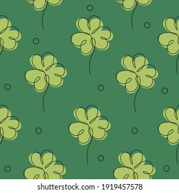 Elegant continuous line seamless pattern with clovers, design elements. Floral pattern for invitations, cards, print, gift wrap, fabric