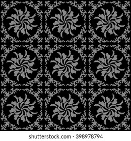 Elegant dark antique background image of round spiral vine kaleidoscope