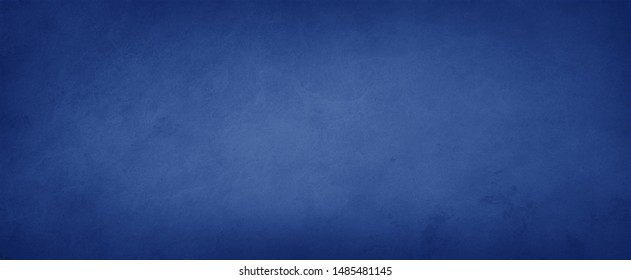 Elegant dark solid blue background with elegant border and rich deep colors with faint vintage texture and light center with blank space