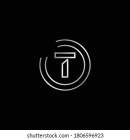 Elegant Design of T Alphabet . Silver Enclosure Logo Design For Letter T. Uppercase Letter T is Enclosed in Two Circle. Modern and Unique Logo Design For Letter T.