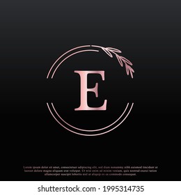 Elegante E Letra Circle Floral Logotipo con creativa elegante línea de rama de hoja monograma y color rosa negro. Usable para negocios, moda, cosméticos, Spa, ciencias, medicina y logotipos de la naturaleza.