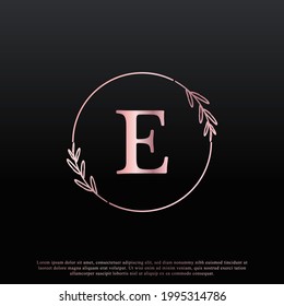 Elegant E Letter Circle Floral Logo with Creative Elegant Leaf Monogram Branch Line and Pink Black Color. Usable for Business, Fashion, Cosmetics, Spa, Science, Medical and Nature Logos.