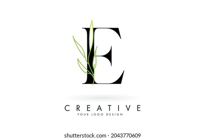 Elegant E letter logo design with long leaves branch vector illustration. Creative icon with letter E and natural elements.