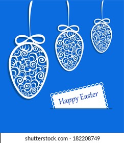 Elegant Easter eggs and card on blue background