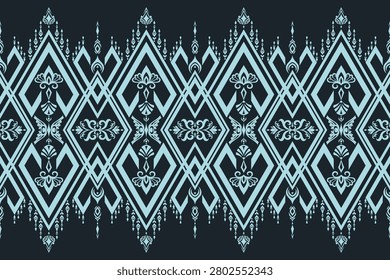 Elegant ethnic geometric seamless pattern with diamond motifs in light blue and charcoal for fabric, wallpaper, upholstery, home decor and surface printing. Hand drawn original artwork, not AI generated.