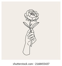 Elegant female hand is holding a flower. Boho illustration. Linear trend vector. Great for decorating souvenirs, clothing, stationery as a print for interior decor, as a template for a postcard