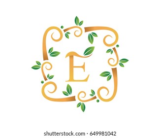 Elegant Floral E Letter With Gold Branch Logo