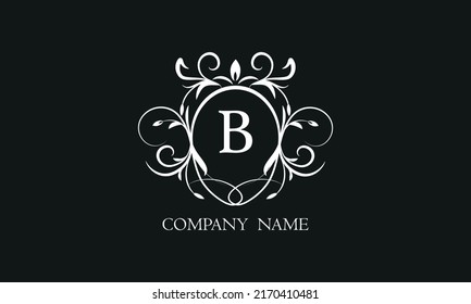 Elegant floral monogram with decorative elements and the letter B. Template for invitations, labels, business. Wedding monograms. Exquisite calligraphic ornament.