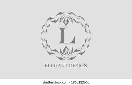 Elegant floral monogram with exquisite elements. Template for invitations, labels, business signs. Vintage ornament with calligraphic letter L