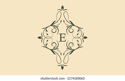 Elegant floral monogram template for one or two letters for example E. Exquisite calligraphic ornament. Business sign, monogram is identical for restaurant, boutique, cafe, hotel, etc