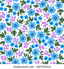 Elegant floral pattern in small blue and lilac flowers. Liberty style. Floral seamless background for fashion prints. Ditsy print. Seamless vector texture. Spring bouquet.