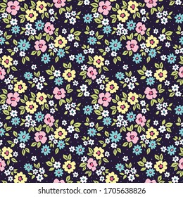 Elegant floral pattern in small colorful flowers. Liberty style. Floral seamless background for fashion prints. Ditsy print. Seamless vector texture. Spring bouquet.