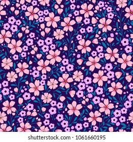 Elegant floral pattern in small pink and lilac flower. Liberty style. Floral seamless background for fashion prints. Ditsy print. Seamless vector texture. Spring bouquet.
