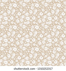 Elegant floral pattern in small white flower. Liberty style. Floral seamless background for fashion prints.
