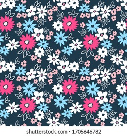 Elegant floral pattern in small white, blue and pink flowers. Liberty style. Floral seamless background for fashion prints. Ditsy print. Seamless vector texture. Spring bouquet.
