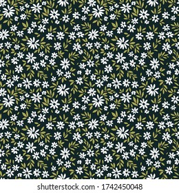 Elegant floral pattern in small white flowers. Liberty style. Floral seamless background for fashion prints. Ditsy print. Seamless vector texture. Spring bouquet.