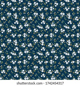 Elegant floral pattern in small white flowers. Liberty style. Floral seamless background for fashion prints. Ditsy print. Seamless vector texture. Spring bouquet.