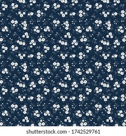 Elegant floral pattern in small white flowers. Liberty style. Floral seamless background for fashion prints. Ditsy print. Seamless vector texture. Spring bouquet.