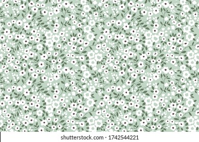 Elegant floral pattern in small white flowers. Liberty style. Floral seamless background for fashion prints. Ditsy print. Seamless vector texture. Spring bouquet.