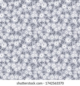 Elegant floral pattern in small white flowers. Liberty style. Floral seamless background for fashion prints. Ditsy print. Seamless vector texture. Spring bouquet.