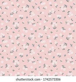 Elegant floral pattern in small white flowers. Liberty style. Floral seamless background for fashion prints. Vintage print. Seamless vector texture. 