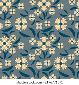 Elegant floral seamless pattern. Yellow art flowers and dark leaves of different sizes are randomly arranged on a gray background. Vector.