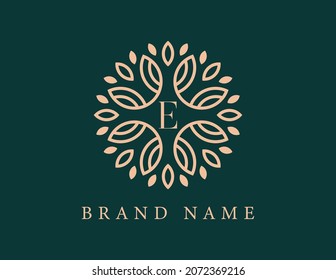 Elegant Flower Emblem Logo with Letter E. Vector logo template