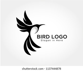 elegant Flying bird art logo