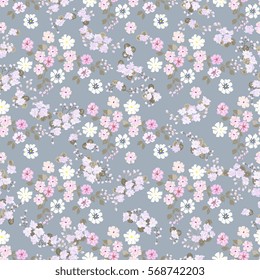 Elegant gentle trendy pattern in small-scale flower. Millefleurs. Liberty style. Floral seamless background for textile, cotton fabric, covers, wallpapers, print, gift wrap and scrapbooking.