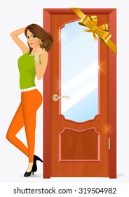 elegant glamour woman in orange pants standing near the door