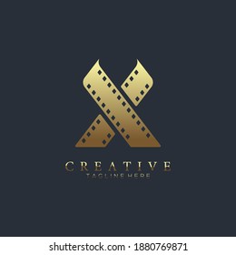 Elegant gold letter X logo for strip film vector illustration and black background