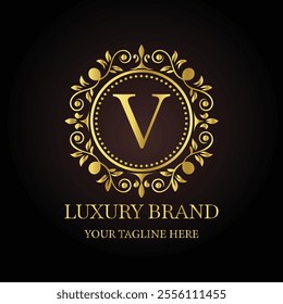 Elegant gold luxury brand logo design V with ornamental floral elements and customizable tagline  
