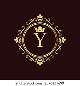 Elegant gold monogram with letter Y and crown design in vintage floral frame on dark background  
